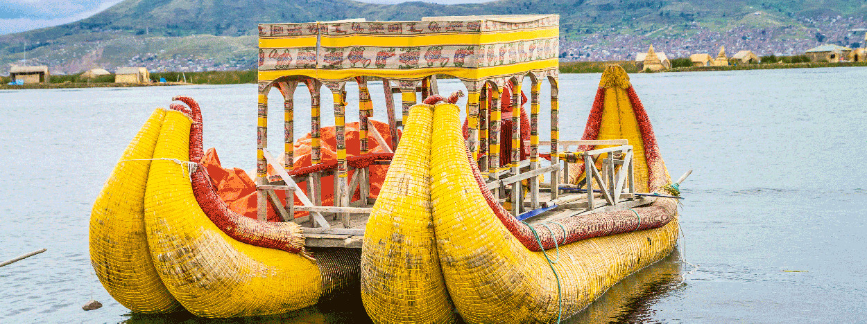 /resource/Images/southamerica/peru/headerimage/Traditional-boats-in-the-floating-and-tourist-Islands-of-lake-Titicaca-Puno-Peru-South-America.jpg